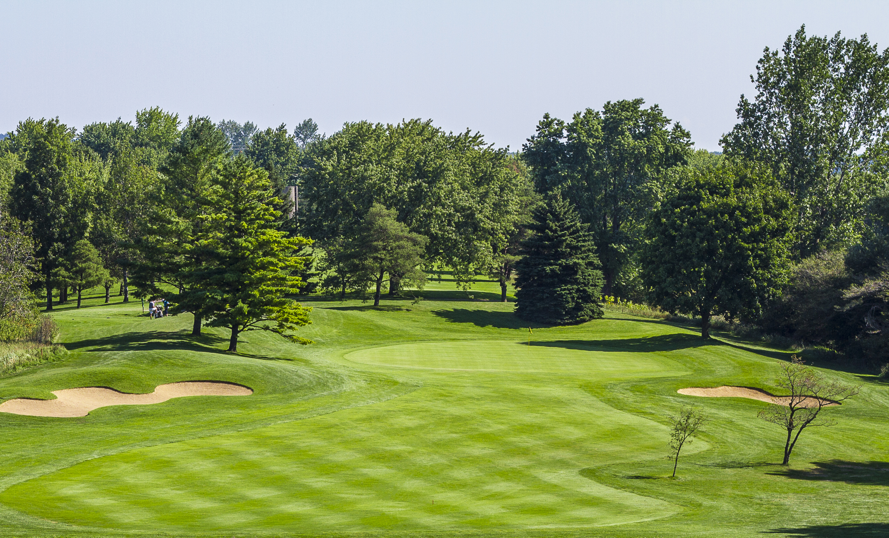 Overlooking the manicured green course of Elmira Golf Club